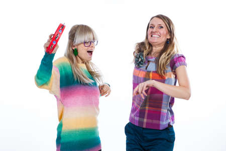 Two girlfriends laughing and ejoying each otherの写真素材