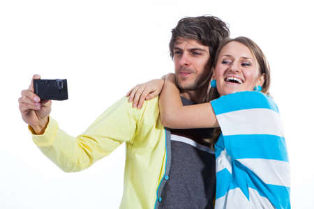 Young couple taking their selfportraitの写真素材