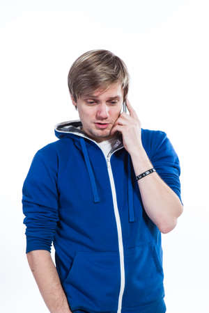 Young man talking on the phoneの写真素材