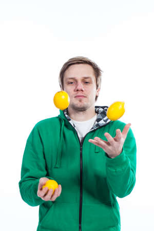 Man juggling with fruit