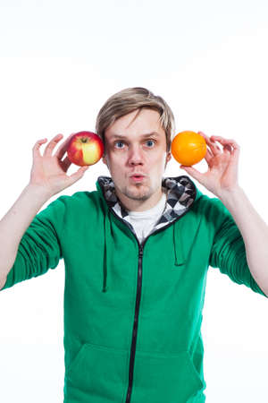 Man juggling with fruitの写真素材