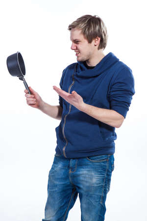 This kitchen pot is funnyの写真素材