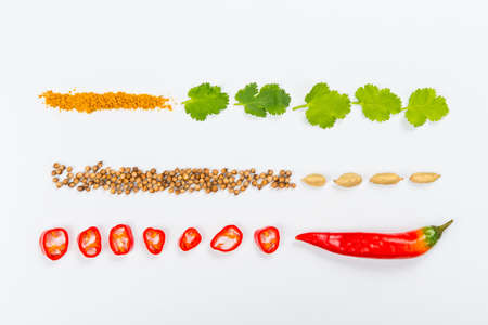 Lines of different food on the white tableの写真素材