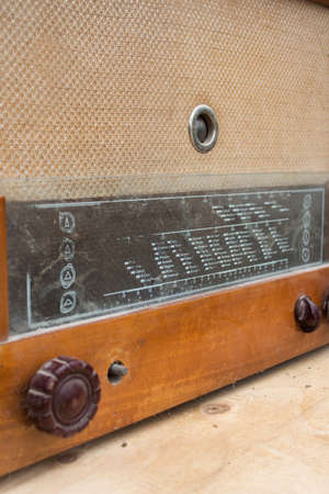 Historical radio tube. Scale of old antique radio with switches.の写真素材