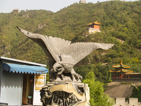 Eagle statue near the Great wall of Chinaの写真素材