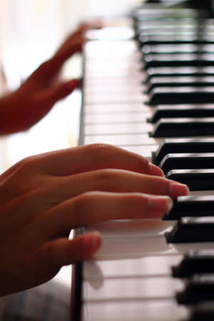 Piano music pianist hands playingの写真素材