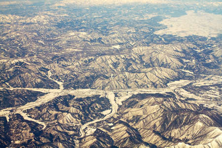 Landscape of snow mountains in Japan near Tokyo, aerial view