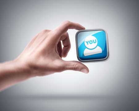 Man's hand holding color APPS icon