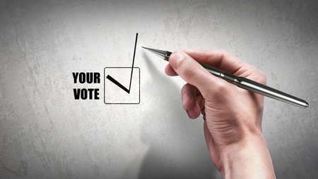 Hand with marker check box の写真素材