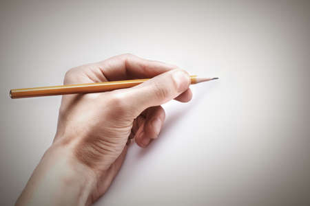 hand with the pencil. free space の写真素材