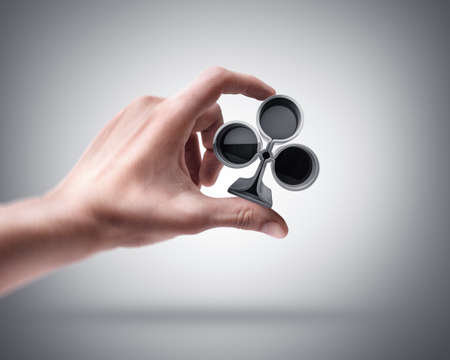 Man's hand holding card signの写真素材