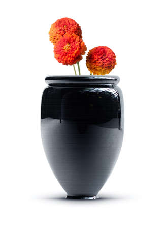 Black vintage vase with a bunch of flowers isolated on white background. High resolutionの写真素材