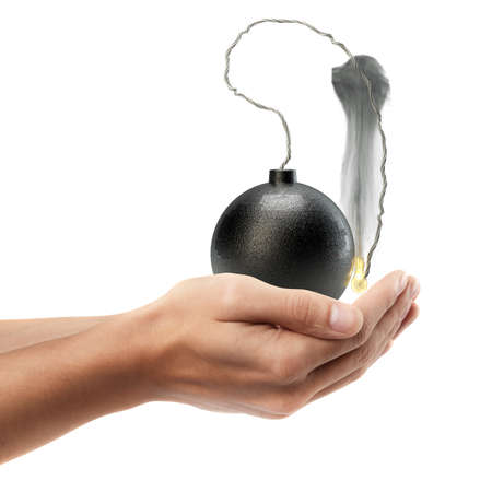 Man hand holding object ( Cannonball bomb )  isolated on white background. High resolution の写真素材