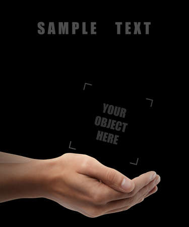 Man hand holding object ( SAMPLE TEXT ) isolated on black background. High resolution の写真素材