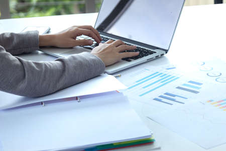 business female working with document at office building