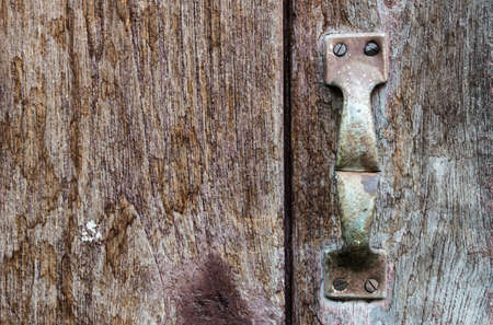 Old barn door with rusty handleの写真素材