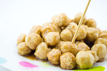 grilled meatballs pour sauceの写真素材