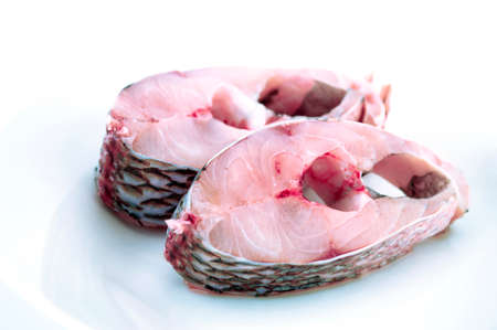 Fillet of Fish tilapia on plateの写真素材