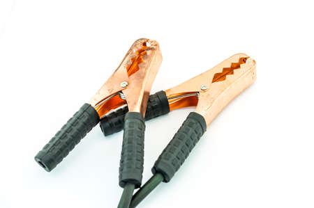 Car battery jump start isolated on white backgroundの写真素材