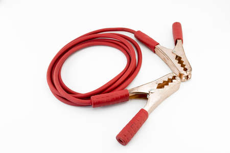 Car battery jump start isolated on white backgroundの写真素材