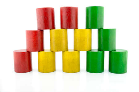Wooden colored toys isolated on white background