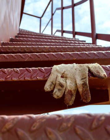 spiral staircase of iron , and gloveの写真素材