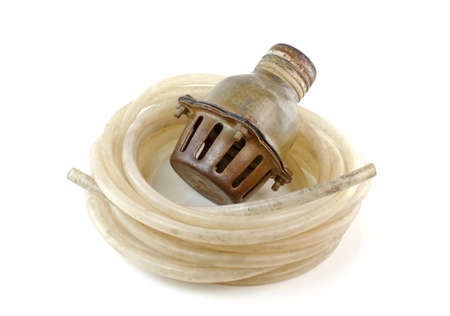 old rubber tube and Rusty foot valve isolated on white background