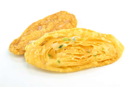 fried crispy roti on white backgroundの写真素材
