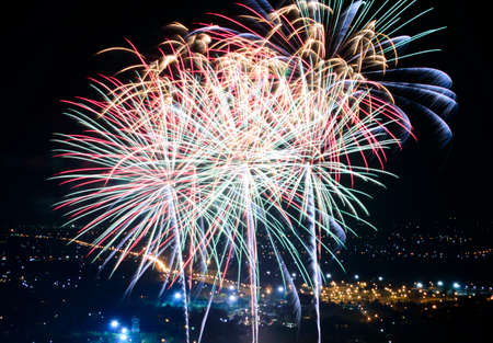 Fireworks on night city backgroundの写真素材