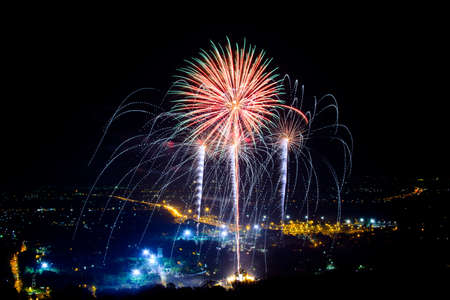 Fireworks Celebration on night city background
