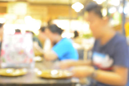 Blurred background : People in Restaurant blur background with bokehの写真素材