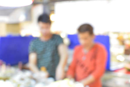 Blur background of customer select product  in supermarketの写真素材
