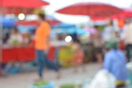 blur crowd on the outdoor market and abstract blur backgroundの写真素材