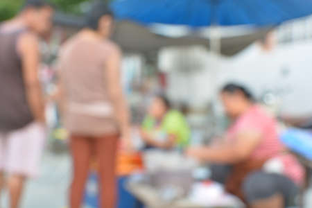 blur crowd on the outdoor market and abstract blur backgroundの写真素材