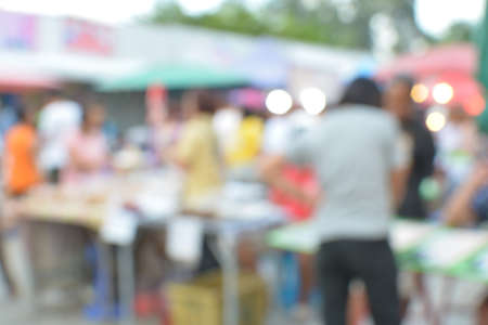 blur crowd on the outdoor market and abstract blur backgroundの写真素材