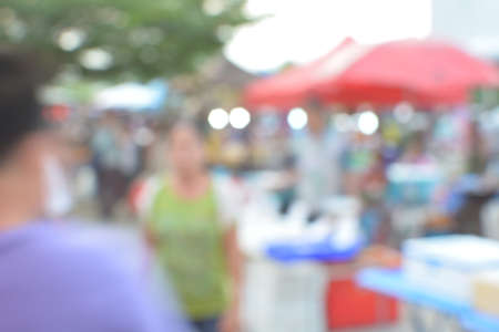 blur crowd on the outdoor market and abstract blur backgroundの写真素材