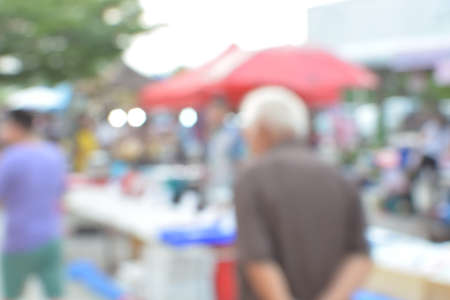 blur crowd on the outdoor market and abstract blur backgroundの写真素材