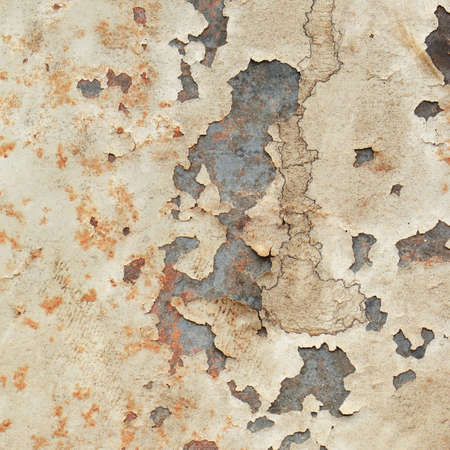 Old rusty metal plate with gray paintの写真素材