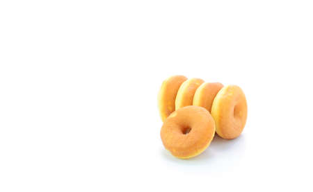 Mini donuts isolated on white backgroundの写真素材