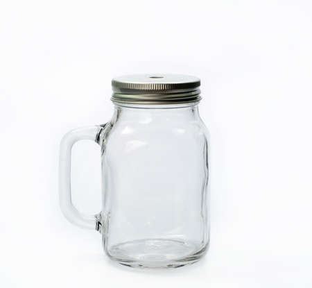 Empty jar with cap on white backgroundの写真素材
