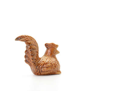 Ceramic chicken on white backgroundの写真素材