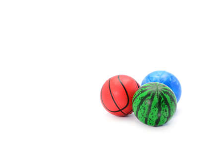 Colorful plastic ball toy isolated on whiteの写真素材