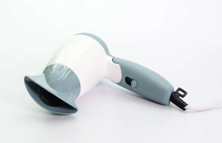 Hair dryer on white background
