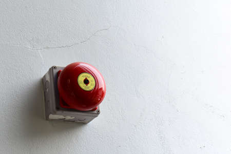 Fire alarm on the white wallの写真素材