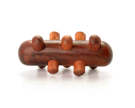 wooden massage isolated on white backgroundの写真素材