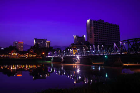 Iron bridge at twilight time in Chiangmai Thailandのeditorial素材