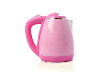 modern pink electric kettle isolated on white backgroundの写真素材