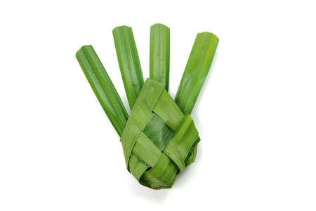 Hand made weaved from palm leafs on white backgroundの写真素材