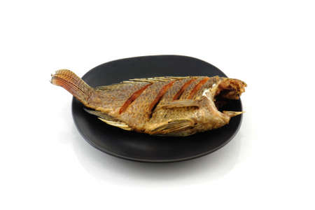 fish fried tilapia isolated on white background