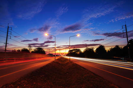 landscape fraffic in highway at evening twilight timeの写真素材